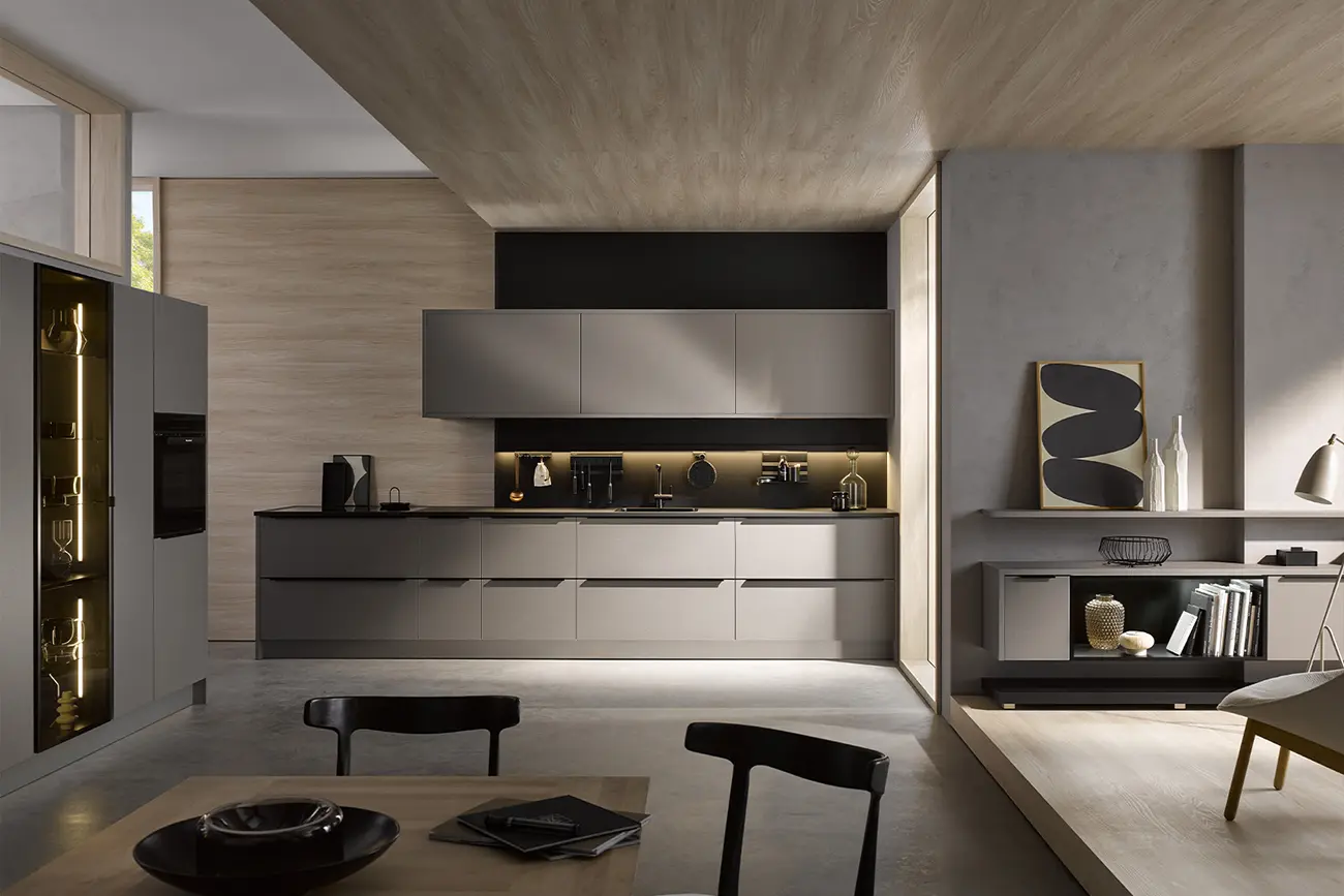 Ein modernes, minimalistisches Küchendesign von Design-Küchen mit eleganten Schränken, integrierten Geräten und einer neutralen Farbpalette, ergänzt durch raffinierte Beleuchtung und dezente Dekorelemente.